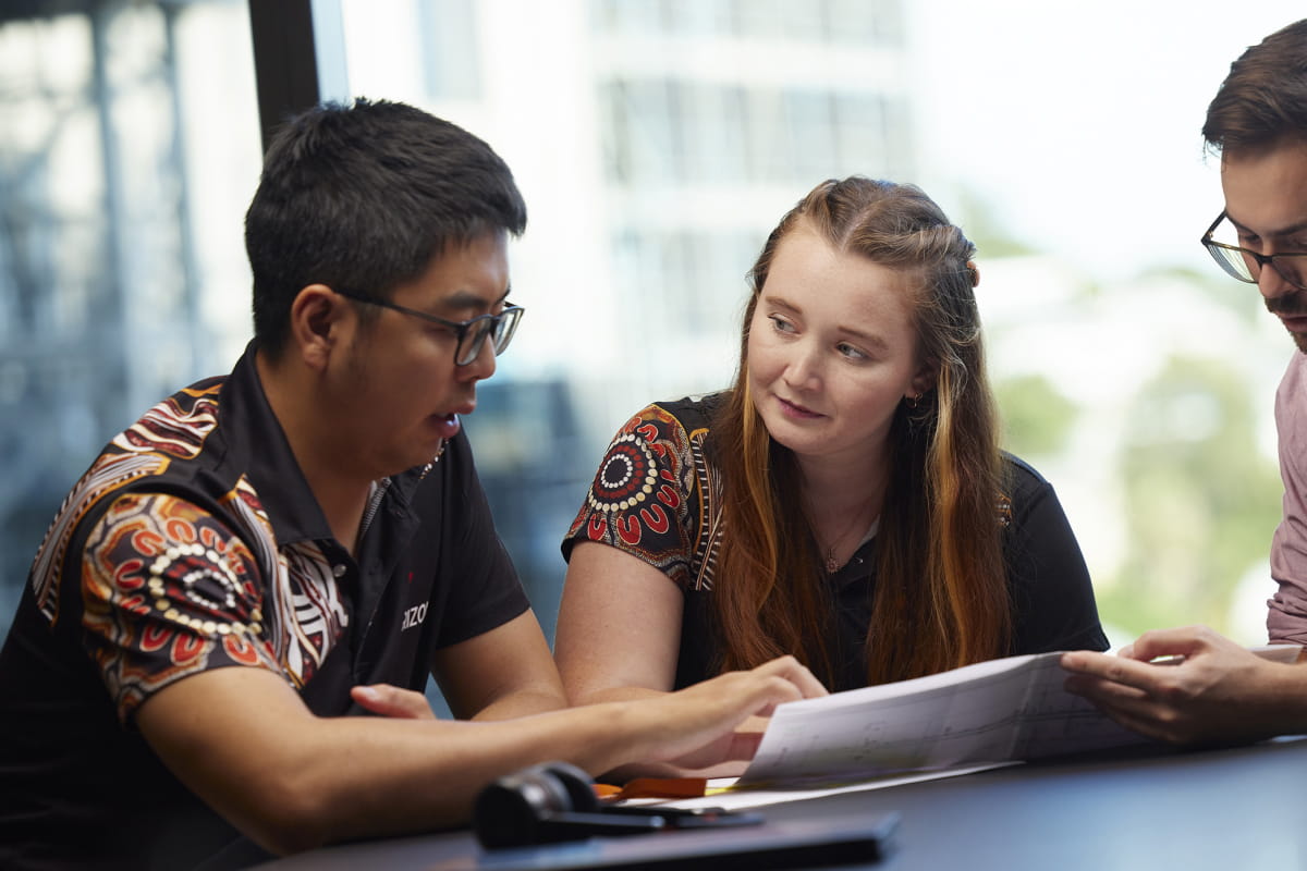 aurizon-graduates-working-table-spotlight