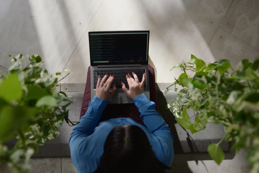 typing-on-laptop-overhead-brand-campaign