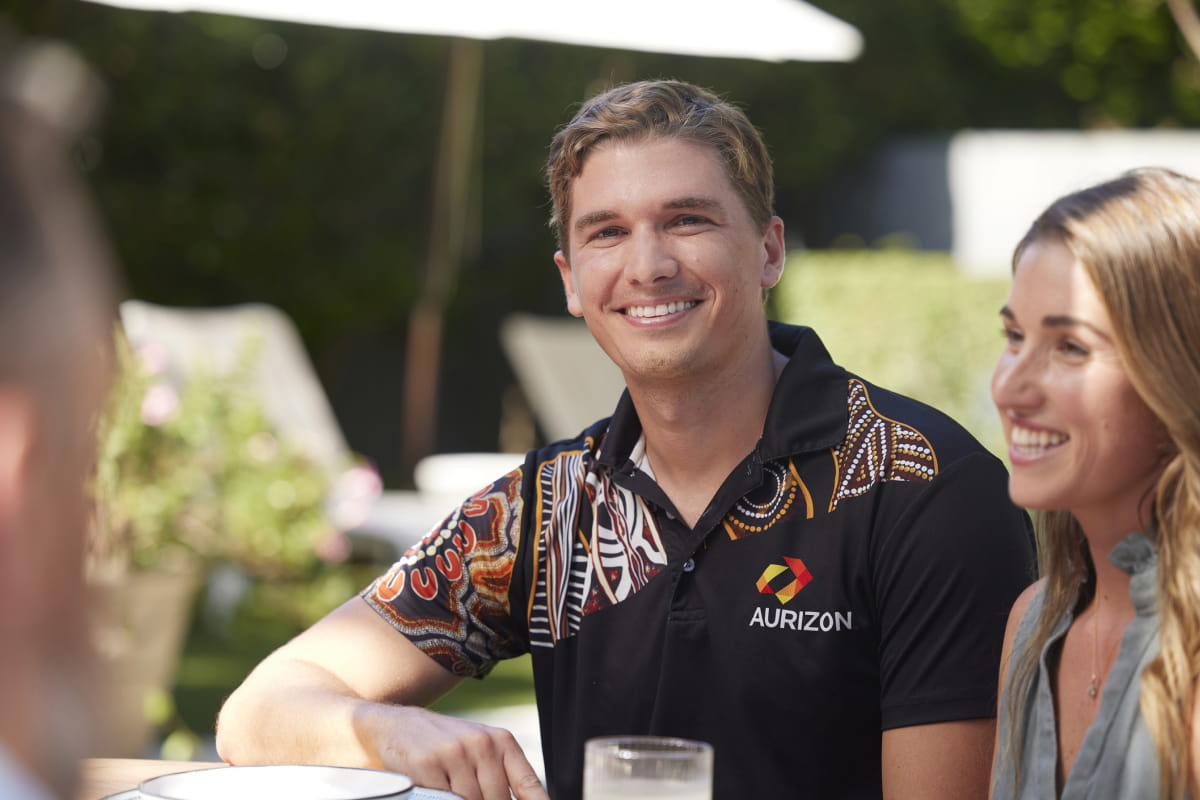 employee-smiling-indigenous-polo