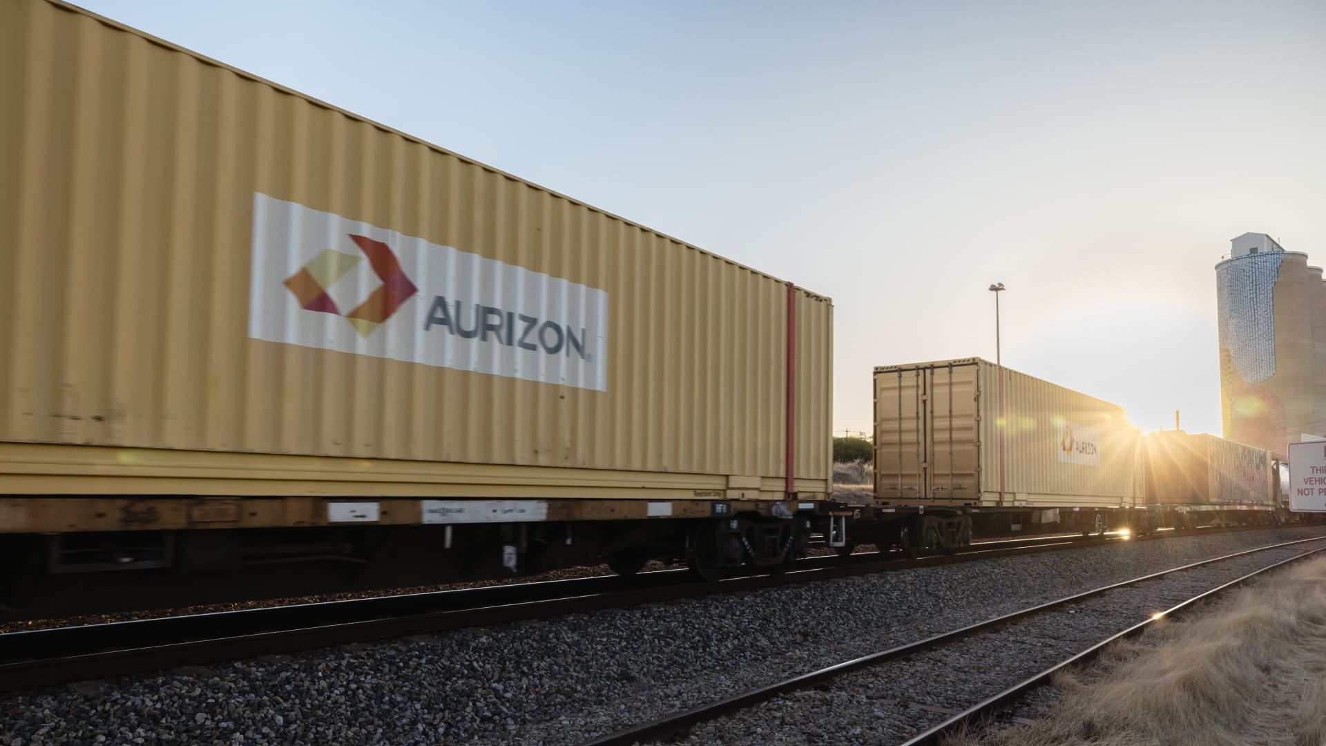containerised-freight-train-sunset