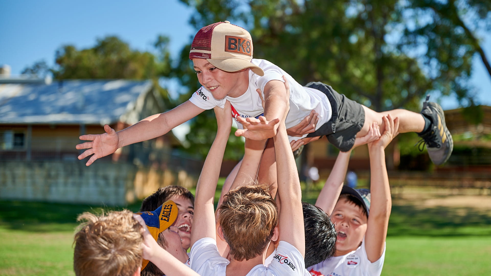 boy-being-held-aloft-zero2hero-charity