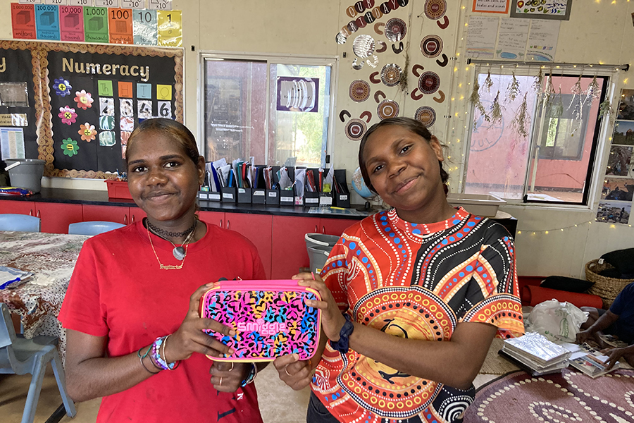 two-students-give-write-charity