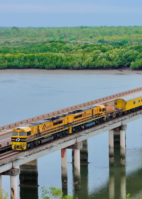 aurizon-northern-iron-train-on-bridge-featured-card (1)